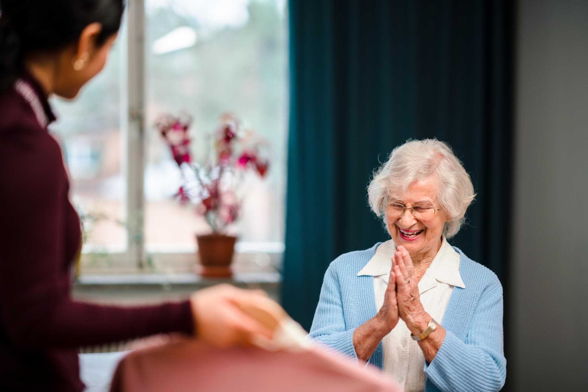 Bromley home care client choosing clothes for the day
