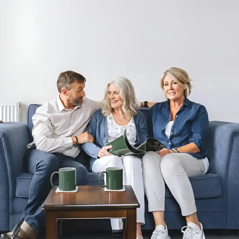 daughter and son sitting with mum discussing dementia care options
