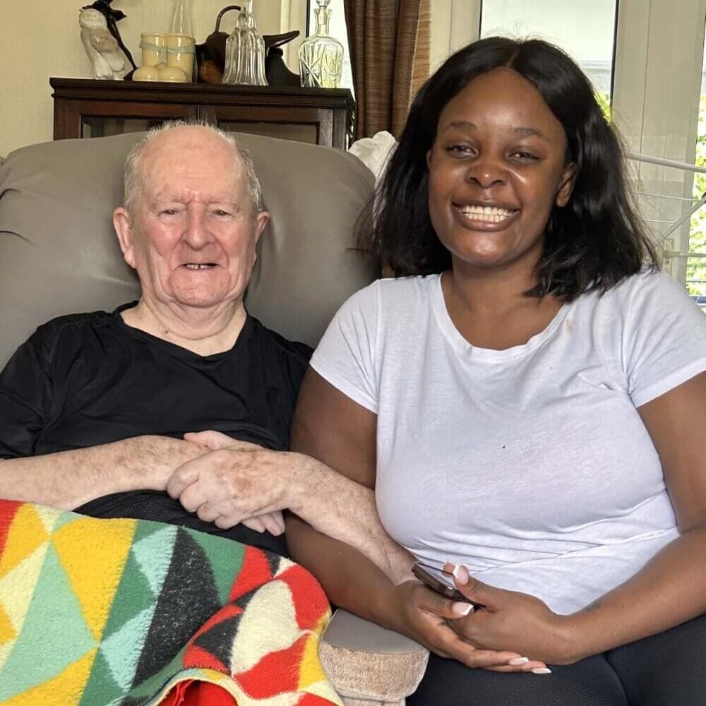 Brian Lynch sitting next to his Care Pro Kundi