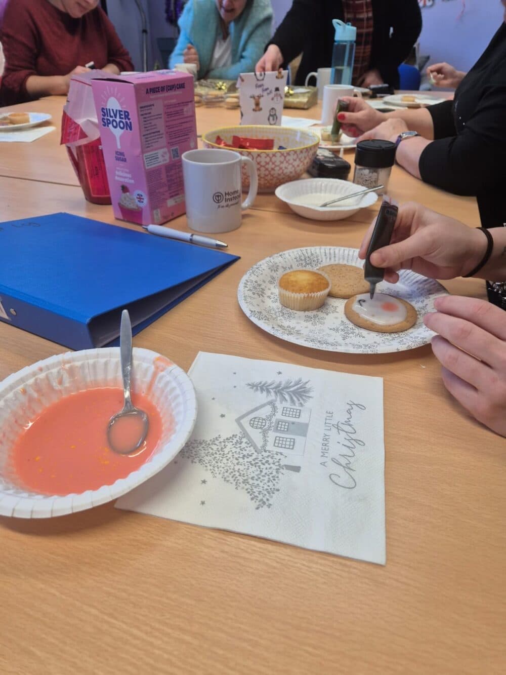 Care Professionals decorating cakes